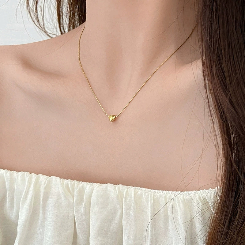 Petit Cœur Necklace — delicate heart pendant necklace detail | THE ARCIVE
