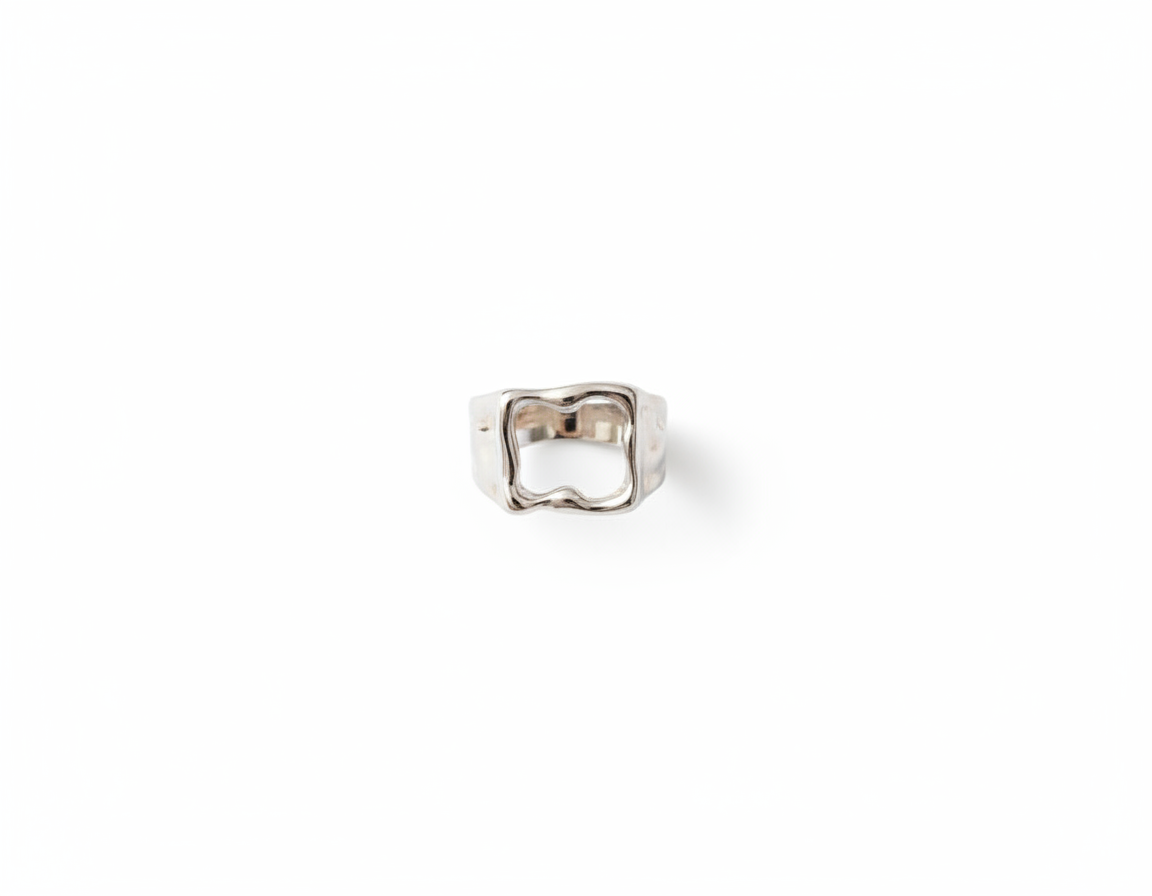 Cadre Ring — architectural ring flat lay | THE ARCIVE