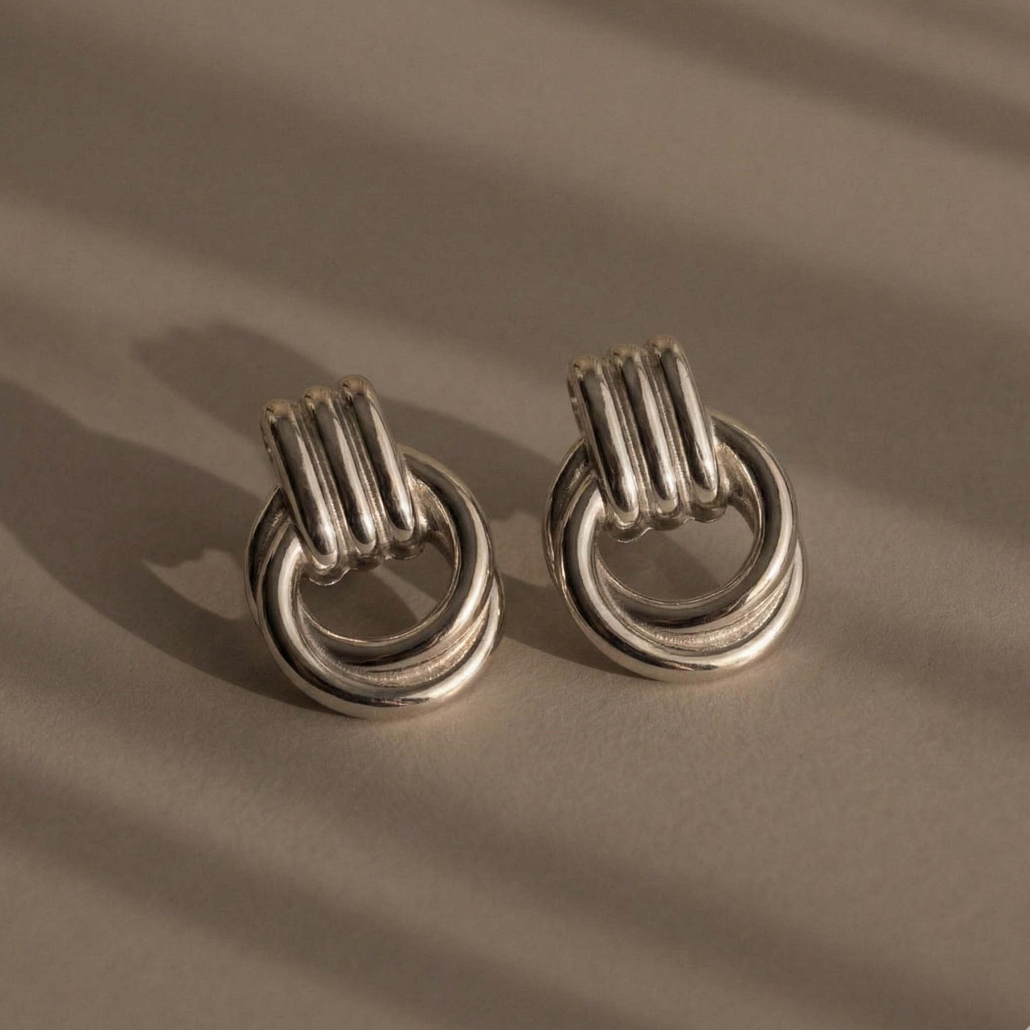 Feuille Drops — leaf drop earrings lifestyle shot | THE ARCIVE