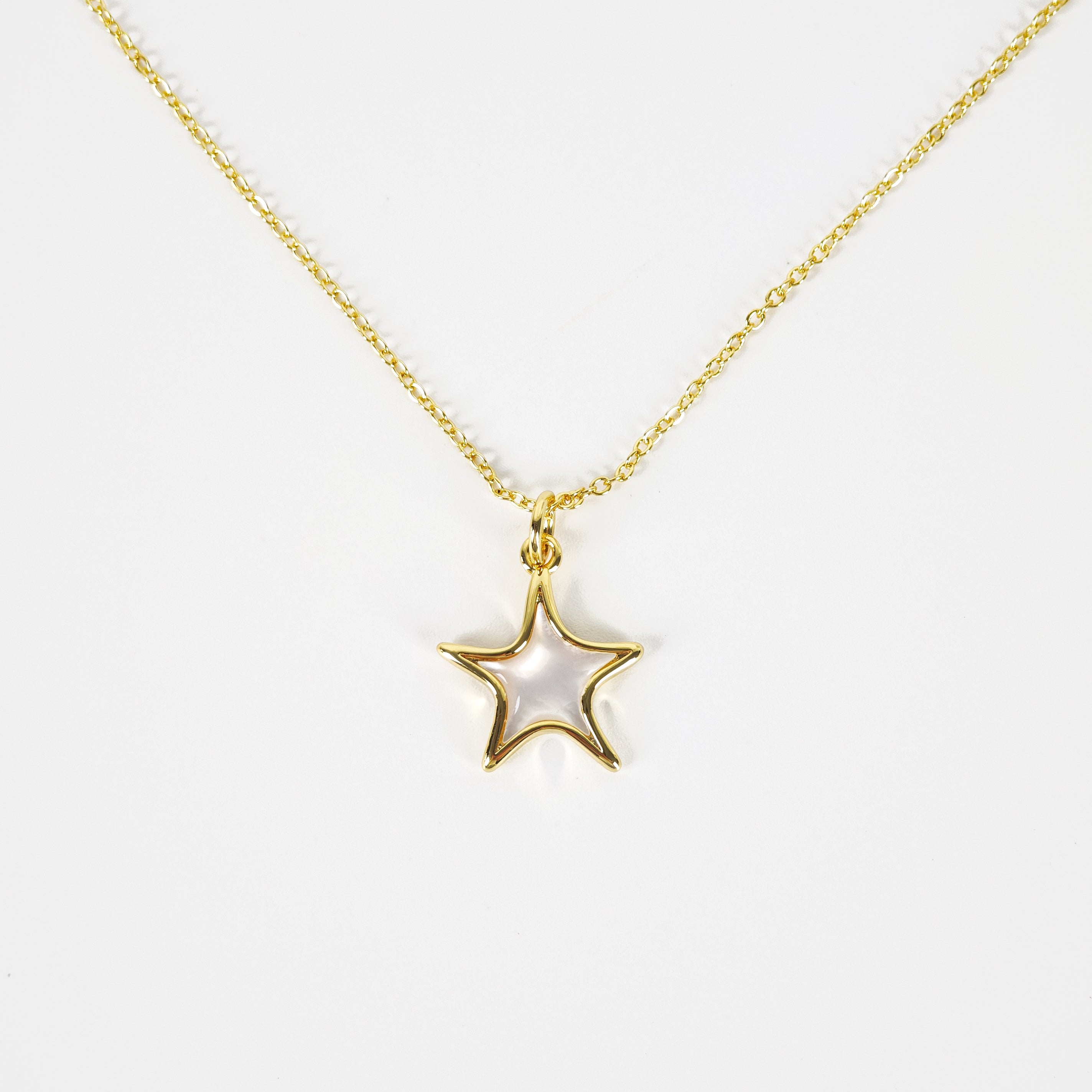 Étoile Perle Pendant Necklace — gold star with pearl centre pendant | THE ARCIVE