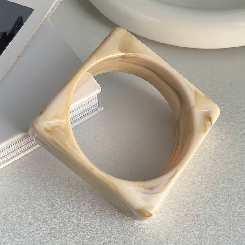Crème Wide Square Bangle — wide cream resin cuff detail | THE ARCIVE