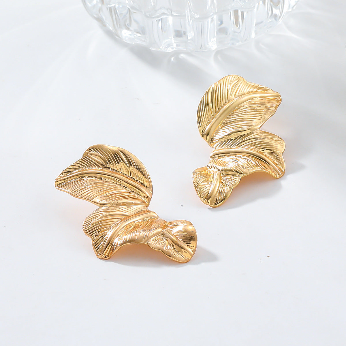 Papillon Studs — gold butterfly earrings angle | THE ARCIVE