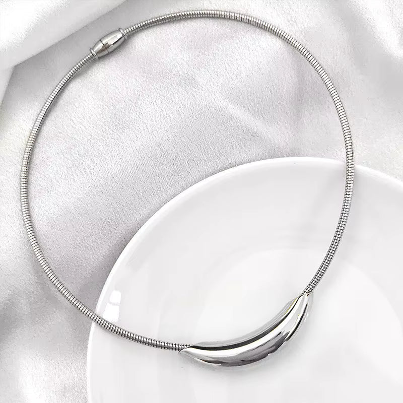 Duo Pendant — silver teardrop and gold oval pendant necklace | THE ARCIVE