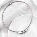 Duo Pendant — silver teardrop and gold oval pendant necklace | THE ARCIVE