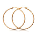 Grand Arc Hoops — oversized arc gold hoop earrings | THE ARCIVE