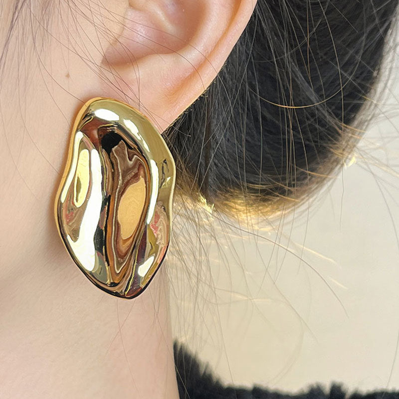 Blade Statement Stud Earrings — architectural wave-blade gold studs | THE ARCIVE
