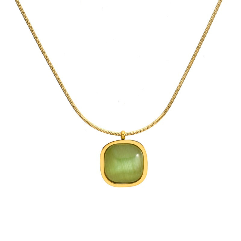 Verdure Pendant Necklace — green cat's eye pendant on snake chain | THE ARCIVE