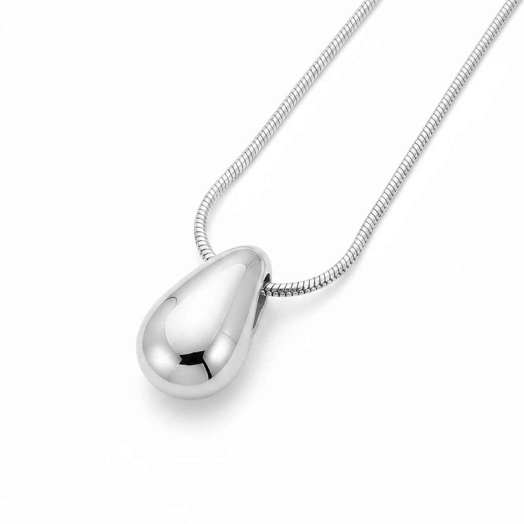 Larme Pendant Necklace — polished teardrop necklace angle | THE ARCIVE