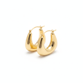 The Crescent Hoops, chunky gold crescent hoop earrings, angled view | THE ARCIVE