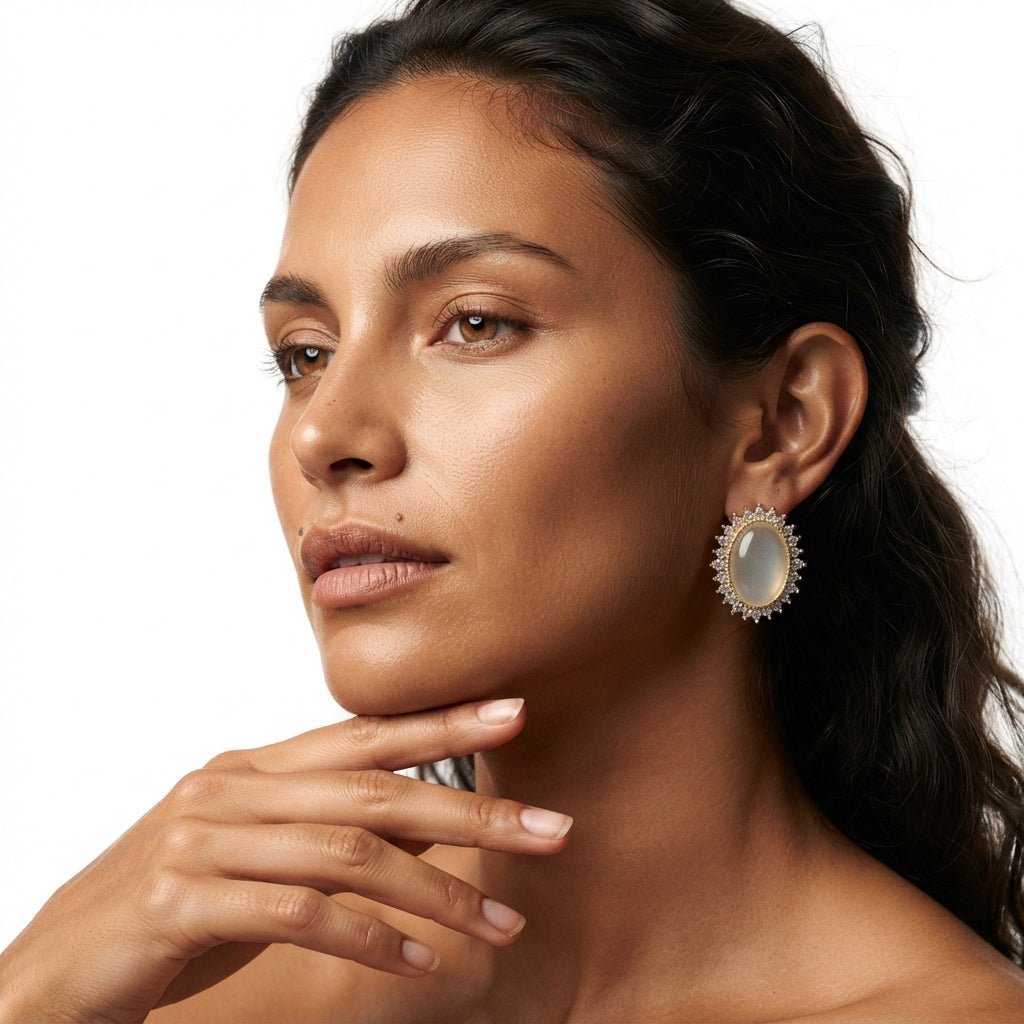 The Duchess Studs, moonstone halo stud earrings, worn on model three-quarter view | THE ARCIVE