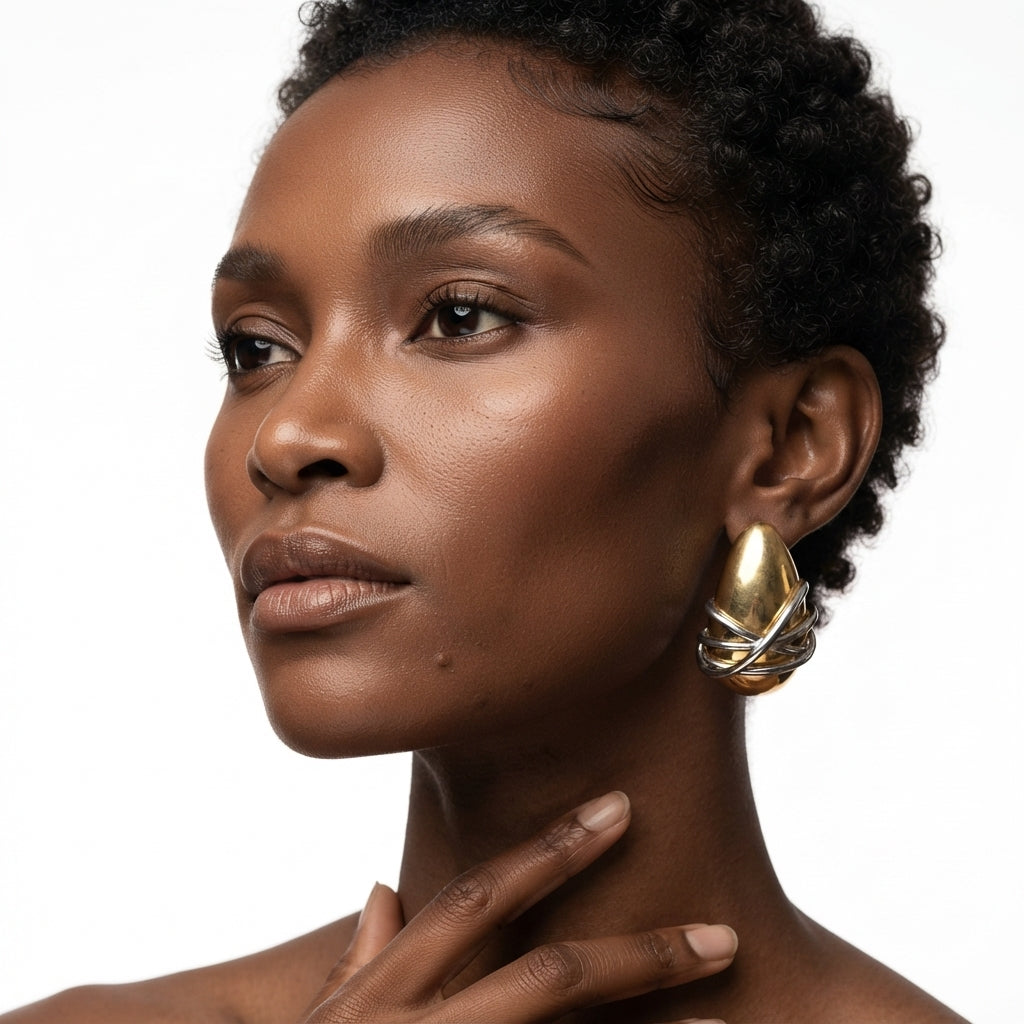 The Entwine Studs, two-tone wrapped dome earrings, worn on model three-quarter view | THE ARCIVE