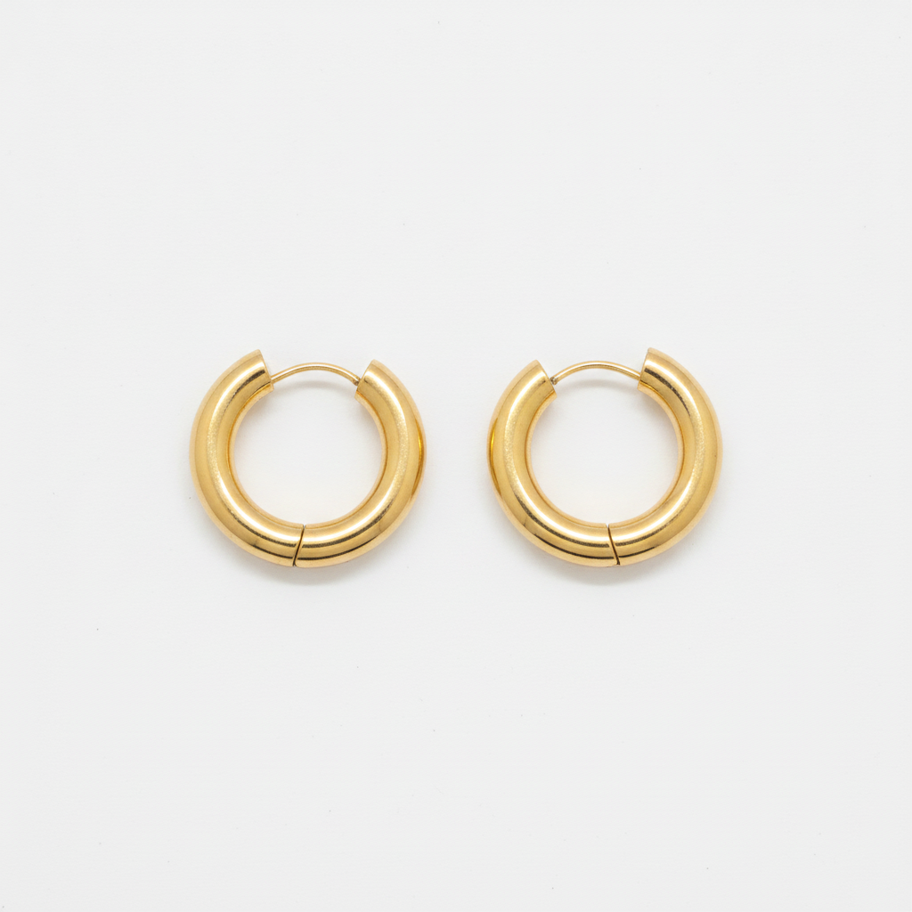 The Gilt Huggies, chunky gold huggie hoop earrings, product view | THE ARCIVE