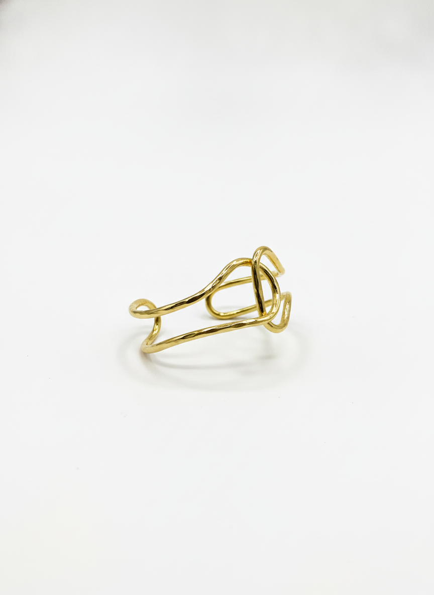 The Lasso Cuff, gold-tone wire knot cuff, angled view | THE ARCIVE