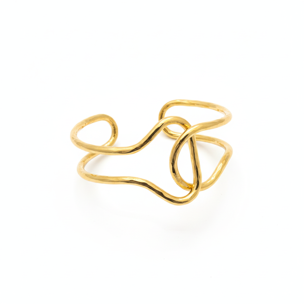 The Lasso Cuff, gold-tone wire knot cuff, flat lay view | THE ARCIVE