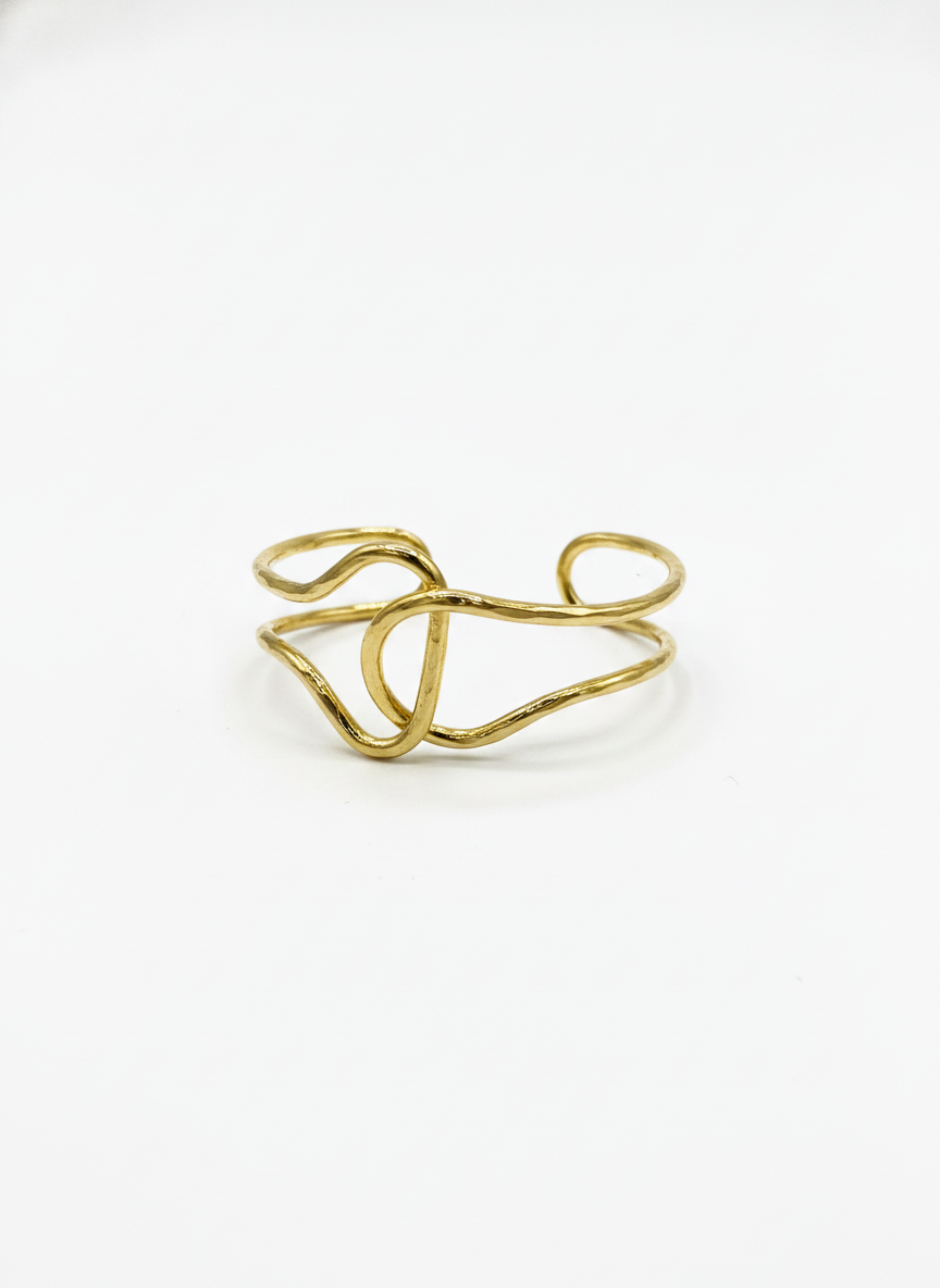 The Lasso Cuff, gold-tone wire knot cuff, flat lay view | THE ARCIVE