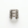 The Nile Cuff, gunmetal coil cuff bracelet, flat lay view | THE ARCIVE