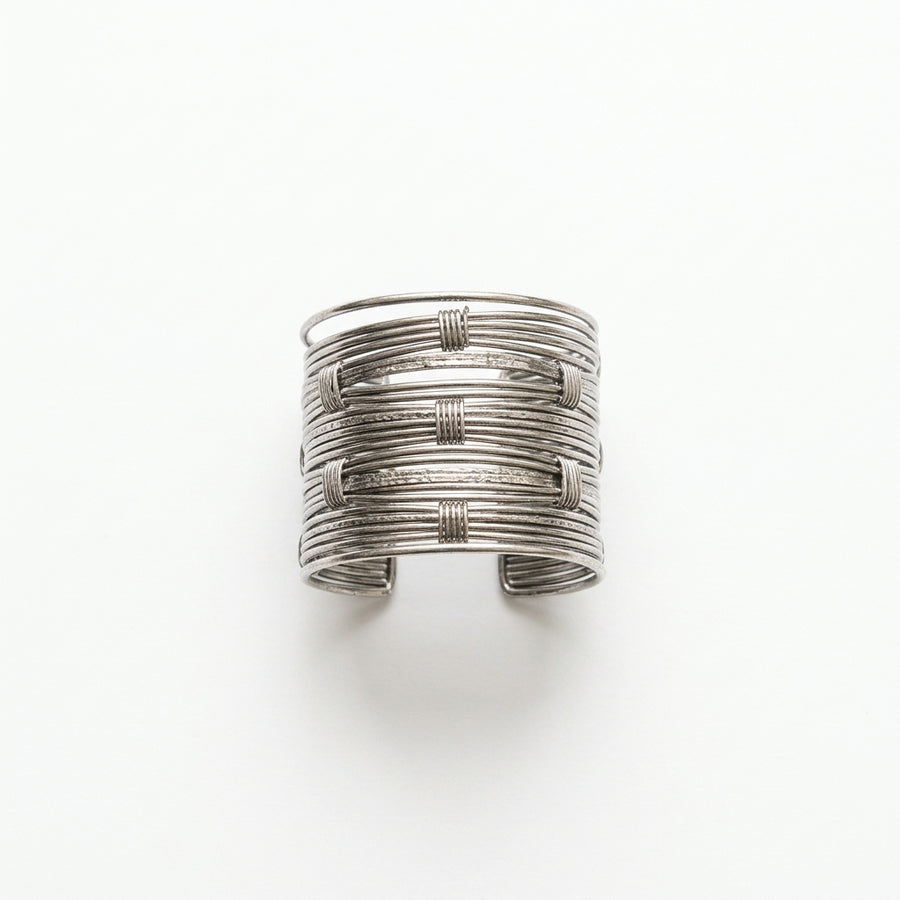 The Nile Cuff, gunmetal coil cuff bracelet, flat lay view | THE ARCIVE