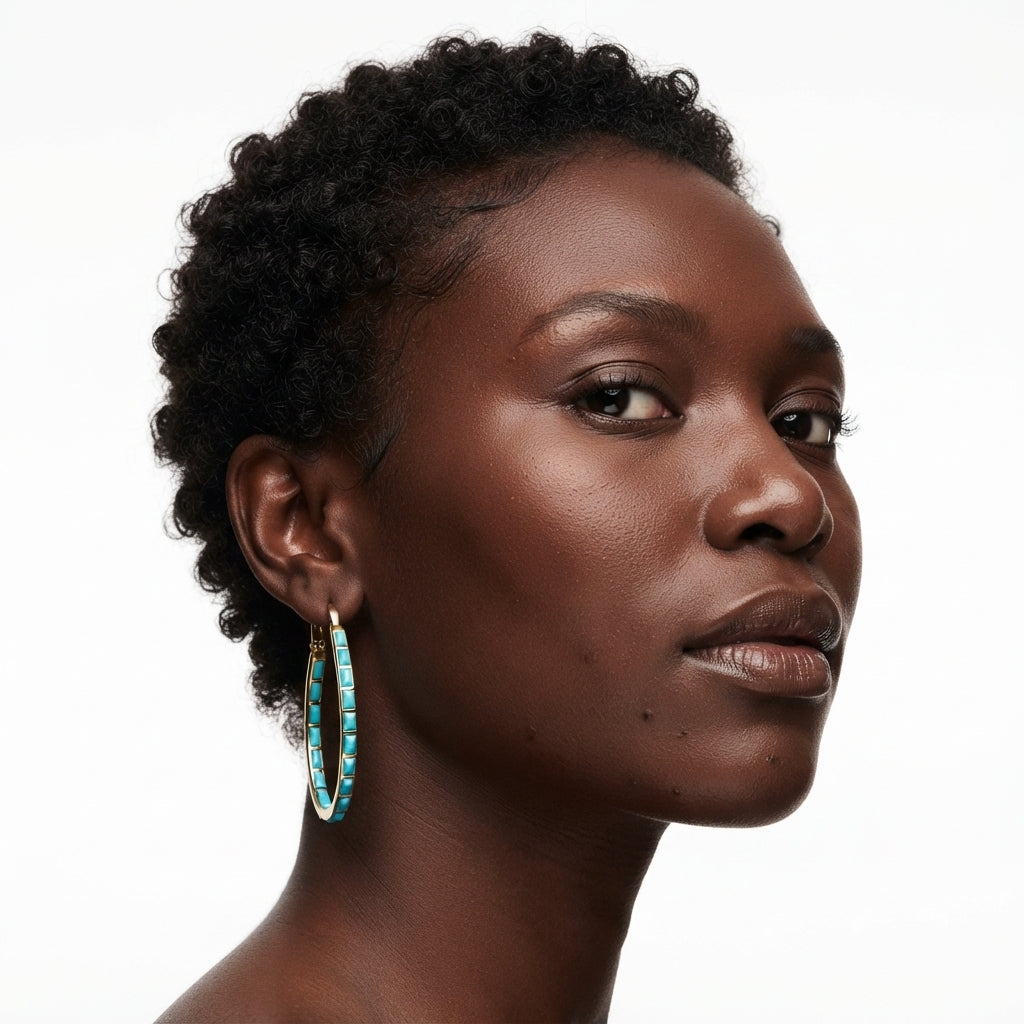 The Oasis Hoops, turquoise inlay oval gold hoops, worn on model three-quarter view | THE ARCIVE