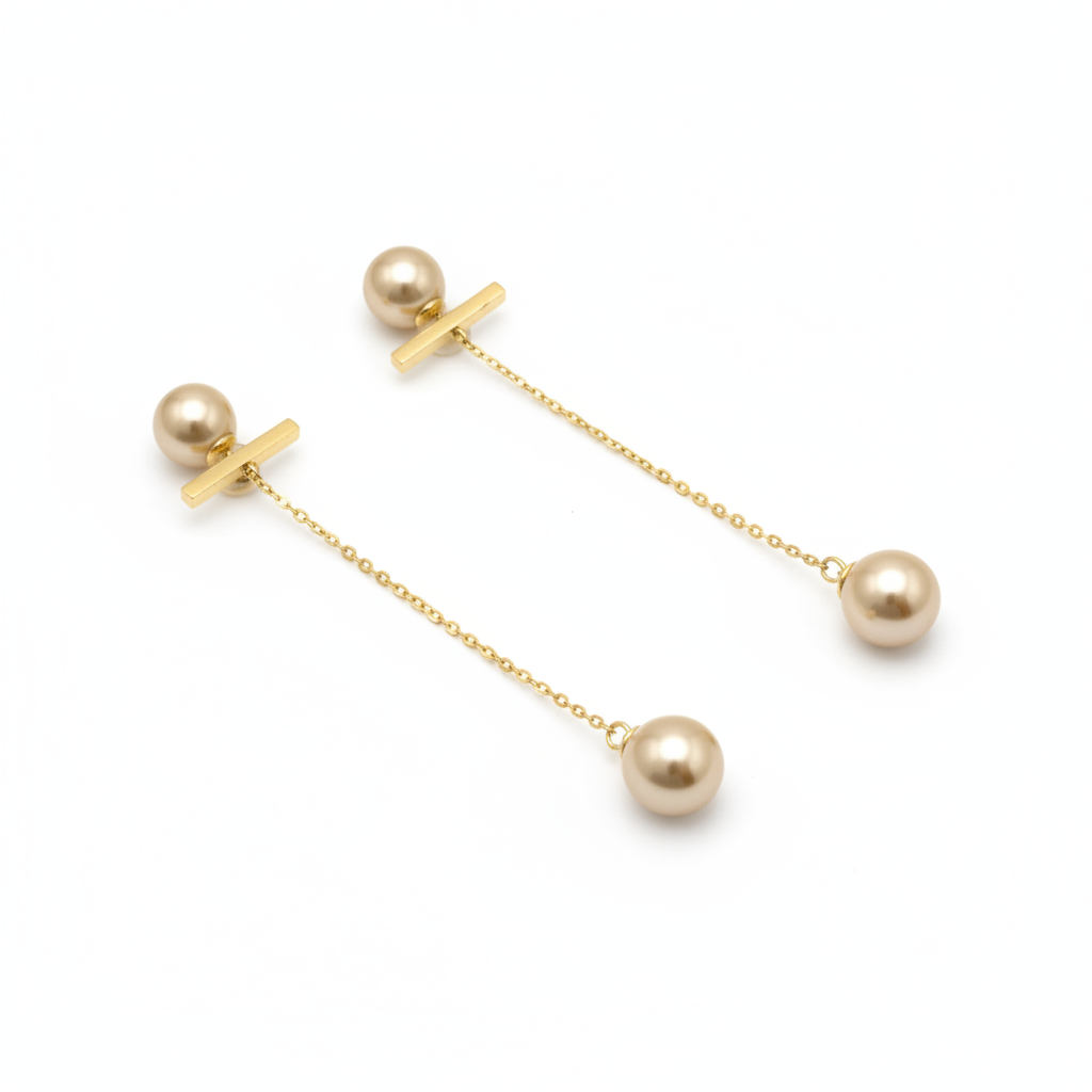 The Pearl Threaders, gold bar pearl threader earrings, angled view | THE ARCIVE