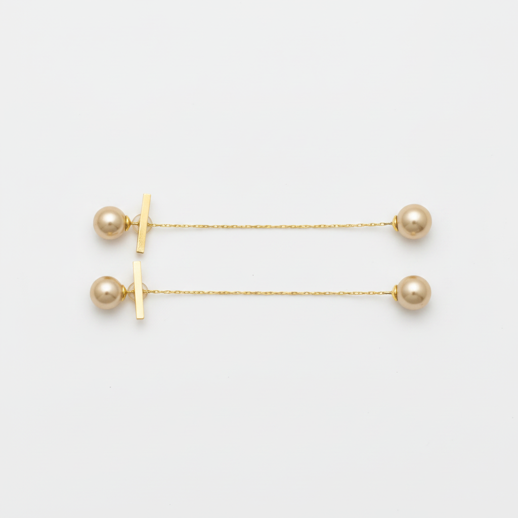 The Pearl Threaders, gold bar pearl threader earrings, front view | THE ARCIVE