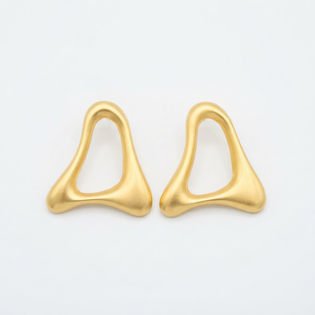 The Sahara Studs, matte gold-tone organic open earrings, product view | THE ARCIVE