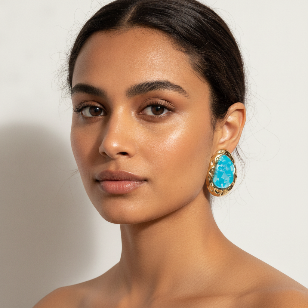 The Tidepool Studs, blue stone hammered gold earrings, worn on model | THE ARCIVE