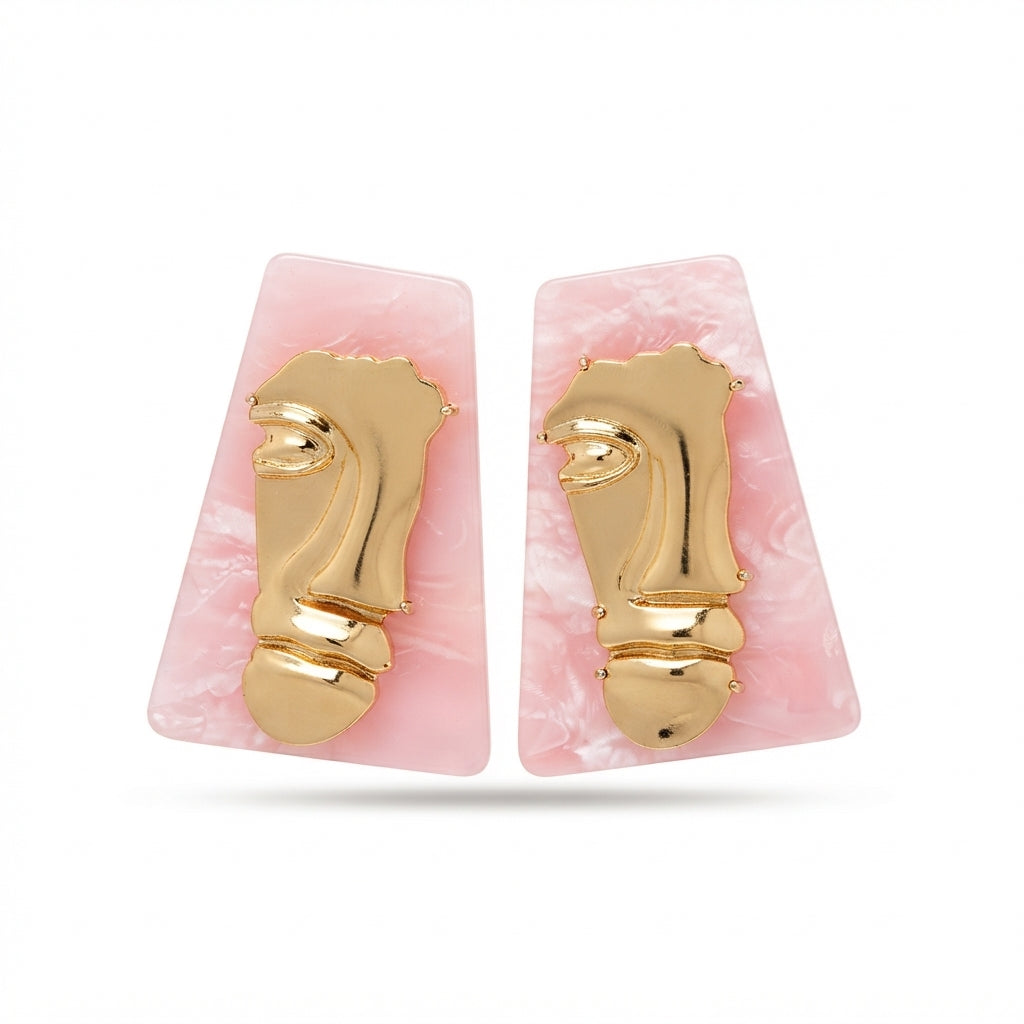 The Visage Studs, gold face and pink marble statement earrings, close-up detail | THE ARCIVE
