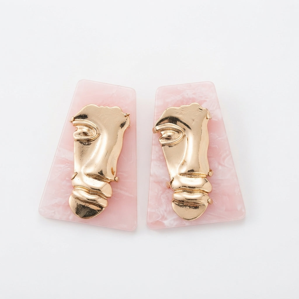 The Visage Studs, gold face and pink marble statement earrings, product view | THE ARCIVE