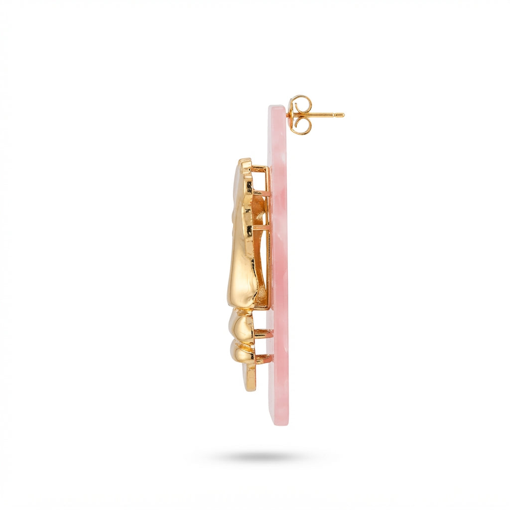 The Visage Studs, gold face and pink marble statement earrings, side view | THE ARCIVE