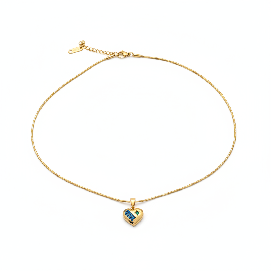Trésor Pendant - heart crystal pendant necklace flat lay | THE ARCIVE