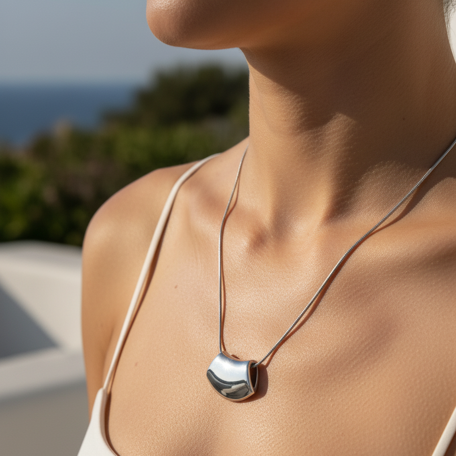 Bombé Pendant Necklace — bold silver pendant angle view | THE ARCIVE